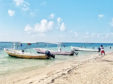 Boats on the beach in Puerto Morelos